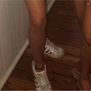 white and pink adidas superstars